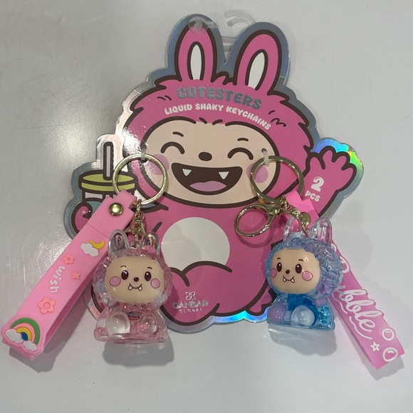 DANBAR GLOBAL Other - NWT Two Cutesters Liquid Shaky Keychains or can be used as bag charms - 2 Pack